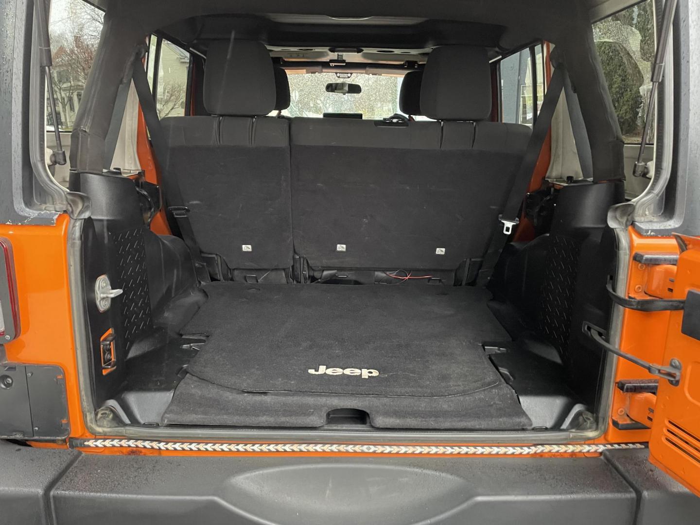 2012 Jeep Wrangler Unlimited Sport 4WD (1C4BJWDG2CL) with an 3.6L V6 DOHC 24V FFV engine, located at 101 N. Main Street, Muncy, PA, 17756, (570) 546-5462, 41.207691, -76.785942 - Photo#9