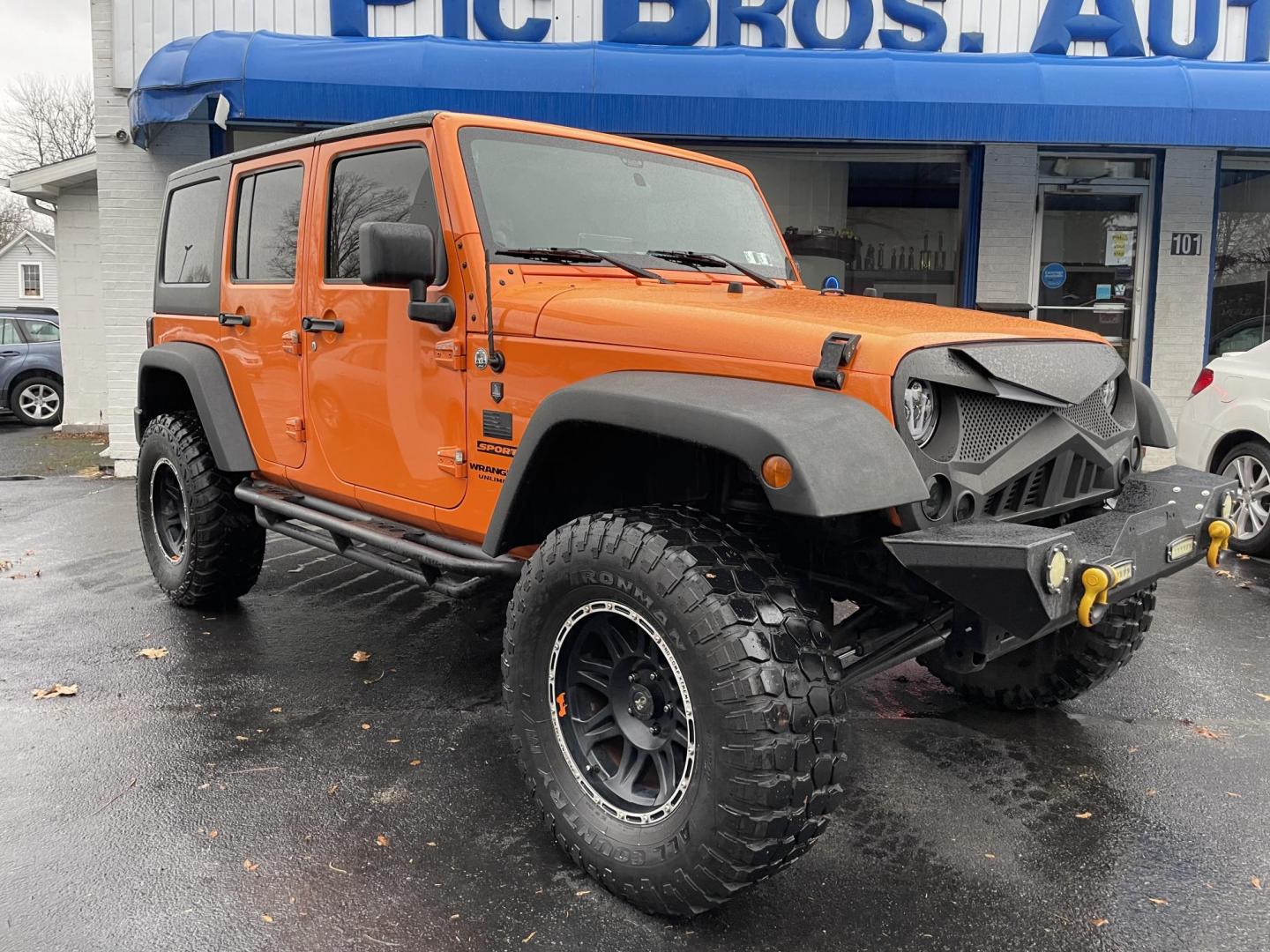 2012 Jeep Wrangler Unlimited Sport 4WD (1C4BJWDG2CL) with an 3.6L V6 DOHC 24V FFV engine, located at 101 N. Main Street, Muncy, PA, 17756, (570) 546-5462, 41.207691, -76.785942 - Photo#1