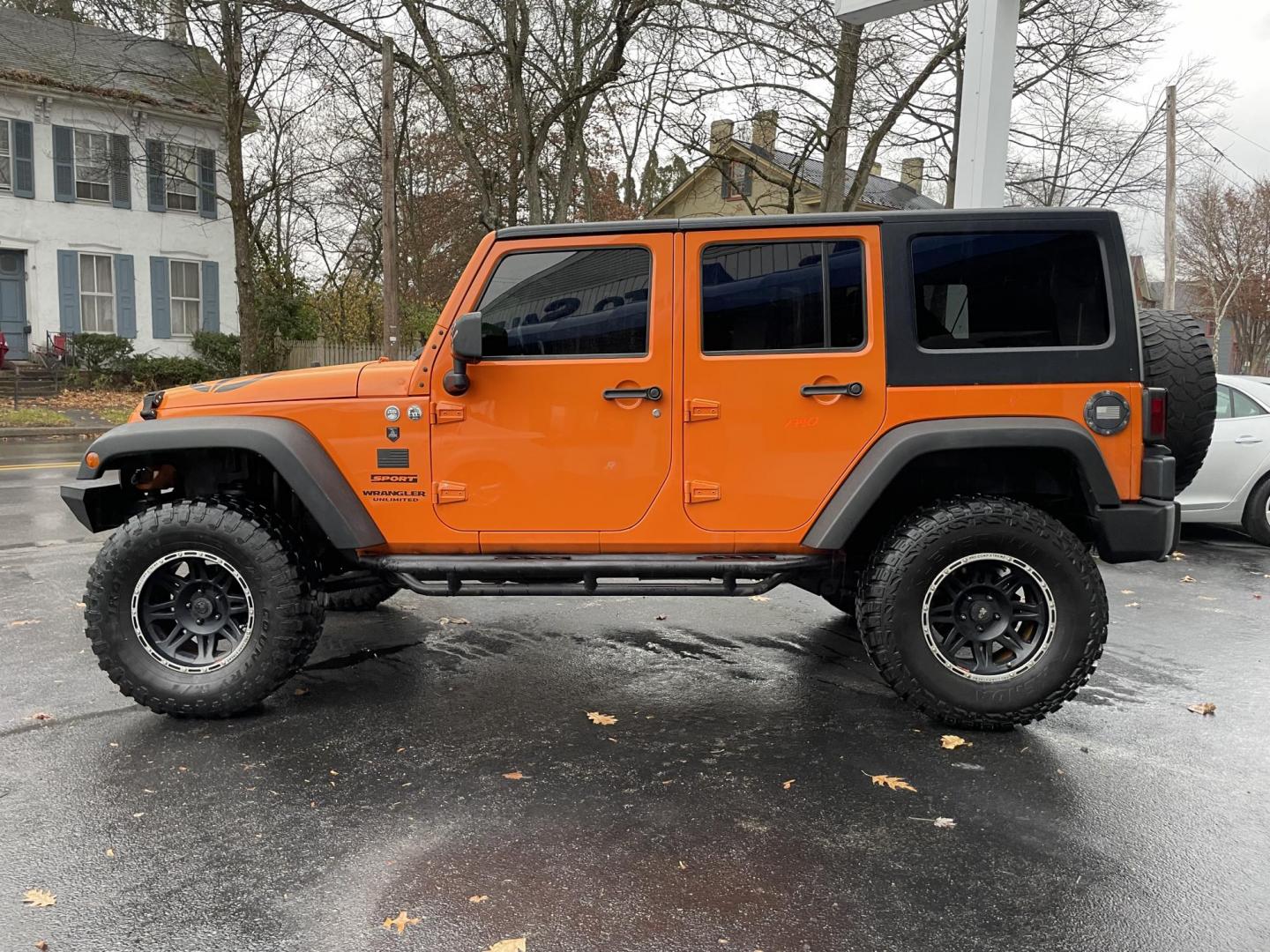 2012 Jeep Wrangler Unlimited Sport 4WD (1C4BJWDG2CL) with an 3.6L V6 DOHC 24V FFV engine, located at 101 N. Main Street, Muncy, PA, 17756, (570) 546-5462, 41.207691, -76.785942 - Photo#2