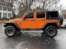 2012 Jeep Wrangler Unlimited Sport 4WD (1C4BJWDG2CL) with an 3.6L V6 DOHC 24V FFV engine, located at 101 N. Main Street, Muncy, PA, 17756, (570) 546-5462, 41.207691, -76.785942 - Photo#2