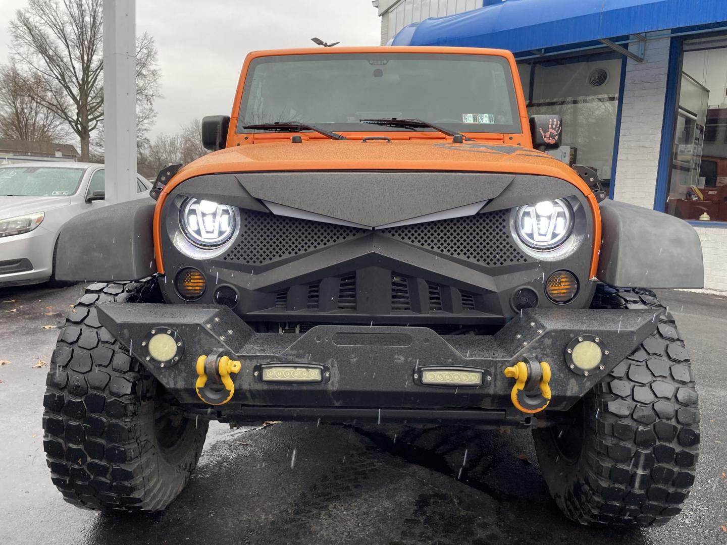 2012 Jeep Wrangler Unlimited Sport 4WD (1C4BJWDG2CL) with an 3.6L V6 DOHC 24V FFV engine, located at 101 N. Main Street, Muncy, PA, 17756, (570) 546-5462, 41.207691, -76.785942 - Photo#5