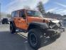 2012 Jeep Wrangler Unlimited Sport 4WD (1C4BJWDG2CL) with an 3.6L V6 DOHC 24V FFV engine, located at 101 N. Main Street, Muncy, PA, 17756, (570) 546-5462, 41.207691, -76.785942 - Photo#2