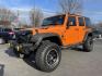 2012 Jeep Wrangler Unlimited Sport 4WD (1C4BJWDG2CL) with an 3.6L V6 DOHC 24V FFV engine, located at 101 N. Main Street, Muncy, PA, 17756, (570) 546-5462, 41.207691, -76.785942 - Photo#0