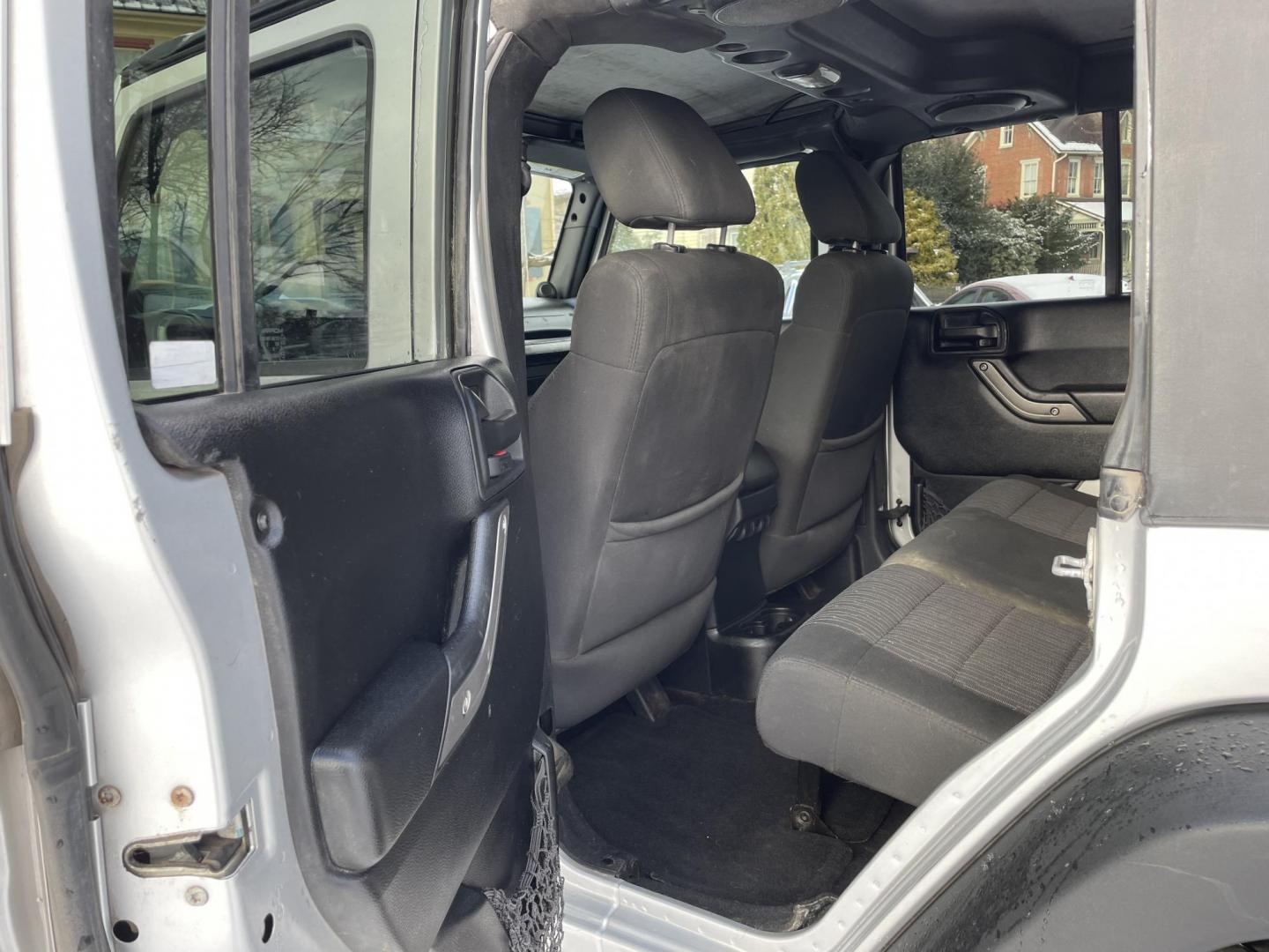 2012 Jeep Wrangler Unlimited Sport 4WD (1C4BJWDG1CL) with an 3.6L V6 DOHC 24V FFV engine, 6 speed manual transmission, located at 101 N. Main Street, Muncy, PA, 17756, (570) 546-5462, 41.207691, -76.785942 - Photo#5