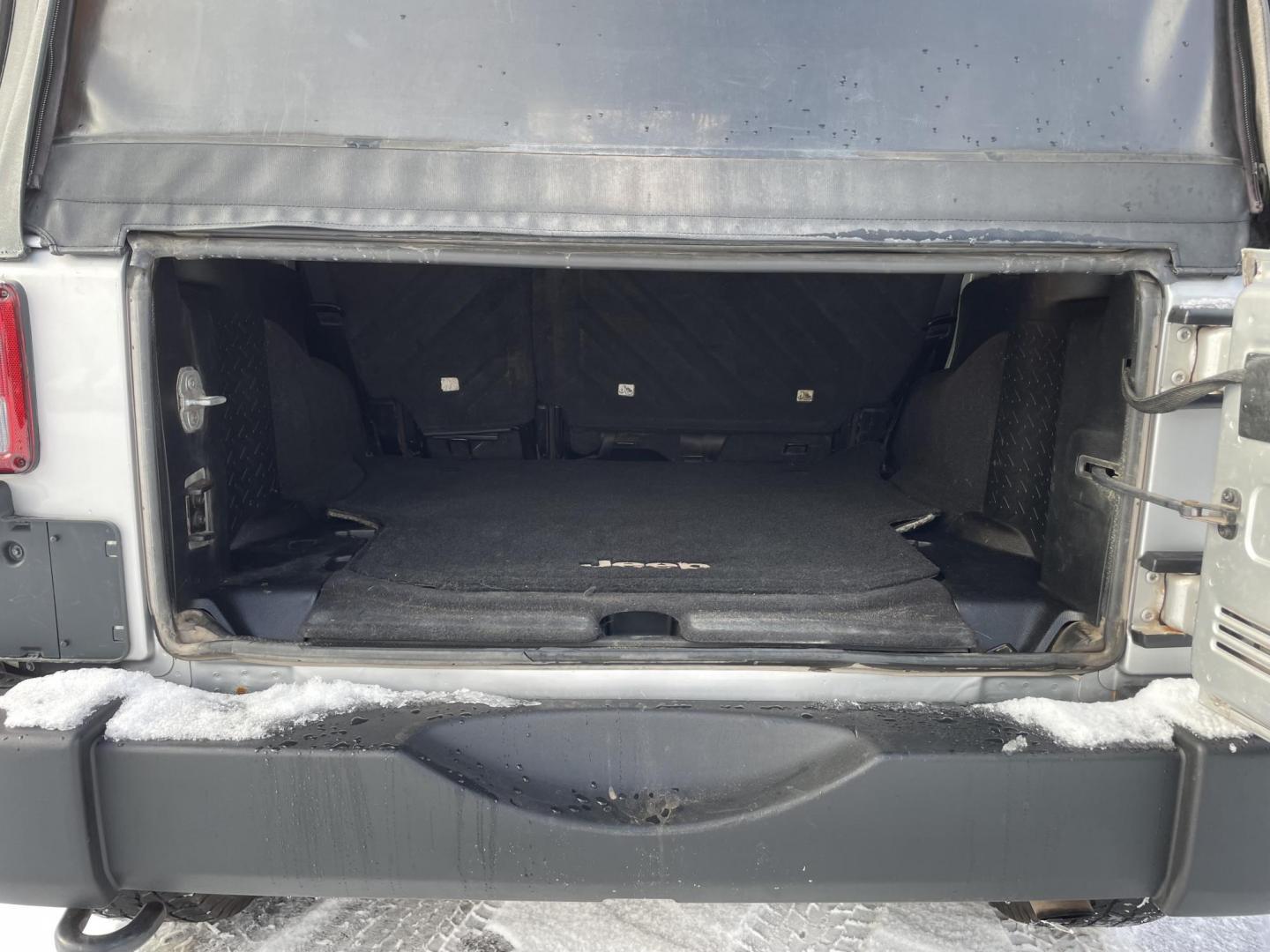 2012 Jeep Wrangler Unlimited Sport 4WD (1C4BJWDG1CL) with an 3.6L V6 DOHC 24V FFV engine, 6 speed manual transmission, located at 101 N. Main Street, Muncy, PA, 17756, (570) 546-5462, 41.207691, -76.785942 - Photo#6