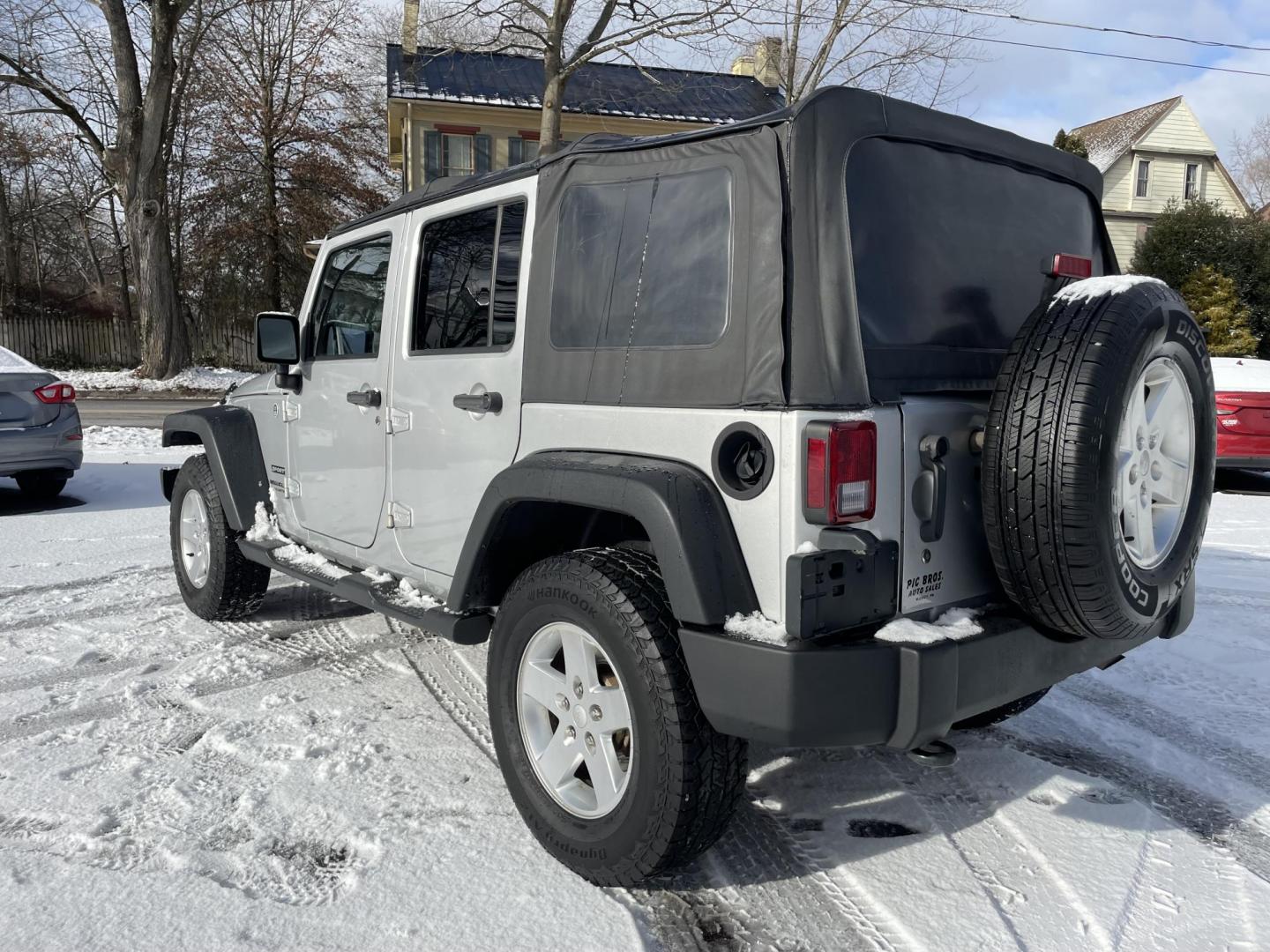 2012 Jeep Wrangler Unlimited Sport 4WD (1C4BJWDG1CL) with an 3.6L V6 DOHC 24V FFV engine, 6 speed manual transmission, located at 101 N. Main Street, Muncy, PA, 17756, (570) 546-5462, 41.207691, -76.785942 - Photo#2