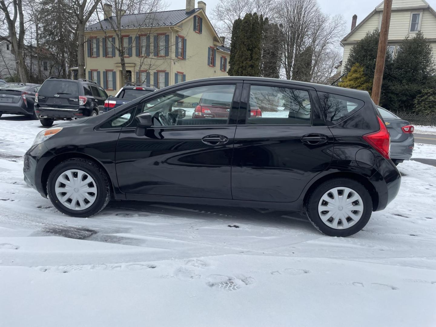 2015 black Nissan Versa Note S (3N1CE2CP3FL) with an 1.6L L4 DOHC 16V engine, 5-Speed Automatic transmission, located at 101 N. Main Street, Muncy, PA, 17756, (570) 546-5462, 41.207691, -76.785942 - Photo#5