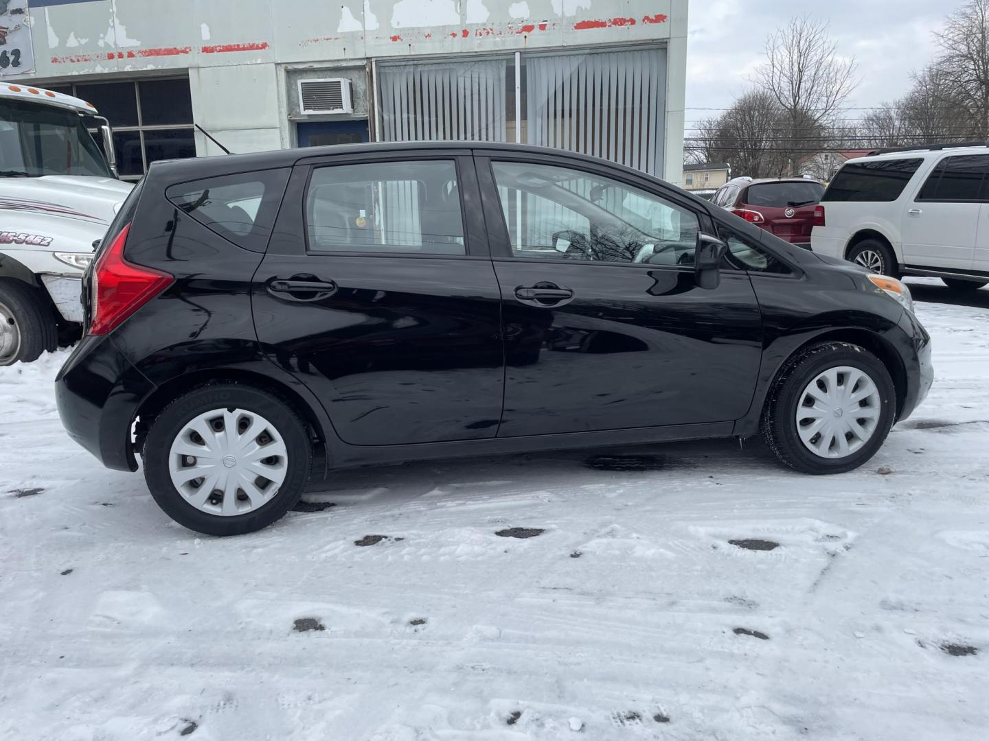 2015 black Nissan Versa Note S (3N1CE2CP3FL) with an 1.6L L4 DOHC 16V engine, 5-Speed Automatic transmission, located at 101 N. Main Street, Muncy, PA, 17756, (570) 546-5462, 41.207691, -76.785942 - Photo#4