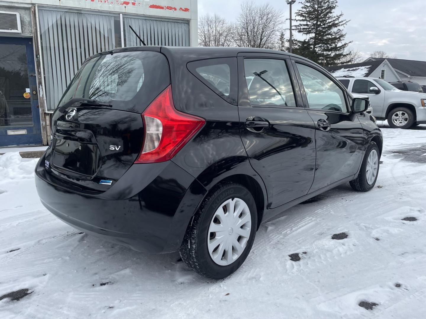 2015 black Nissan Versa Note S (3N1CE2CP3FL) with an 1.6L L4 DOHC 16V engine, 5-Speed Automatic transmission, located at 101 N. Main Street, Muncy, PA, 17756, (570) 546-5462, 41.207691, -76.785942 - Photo#3