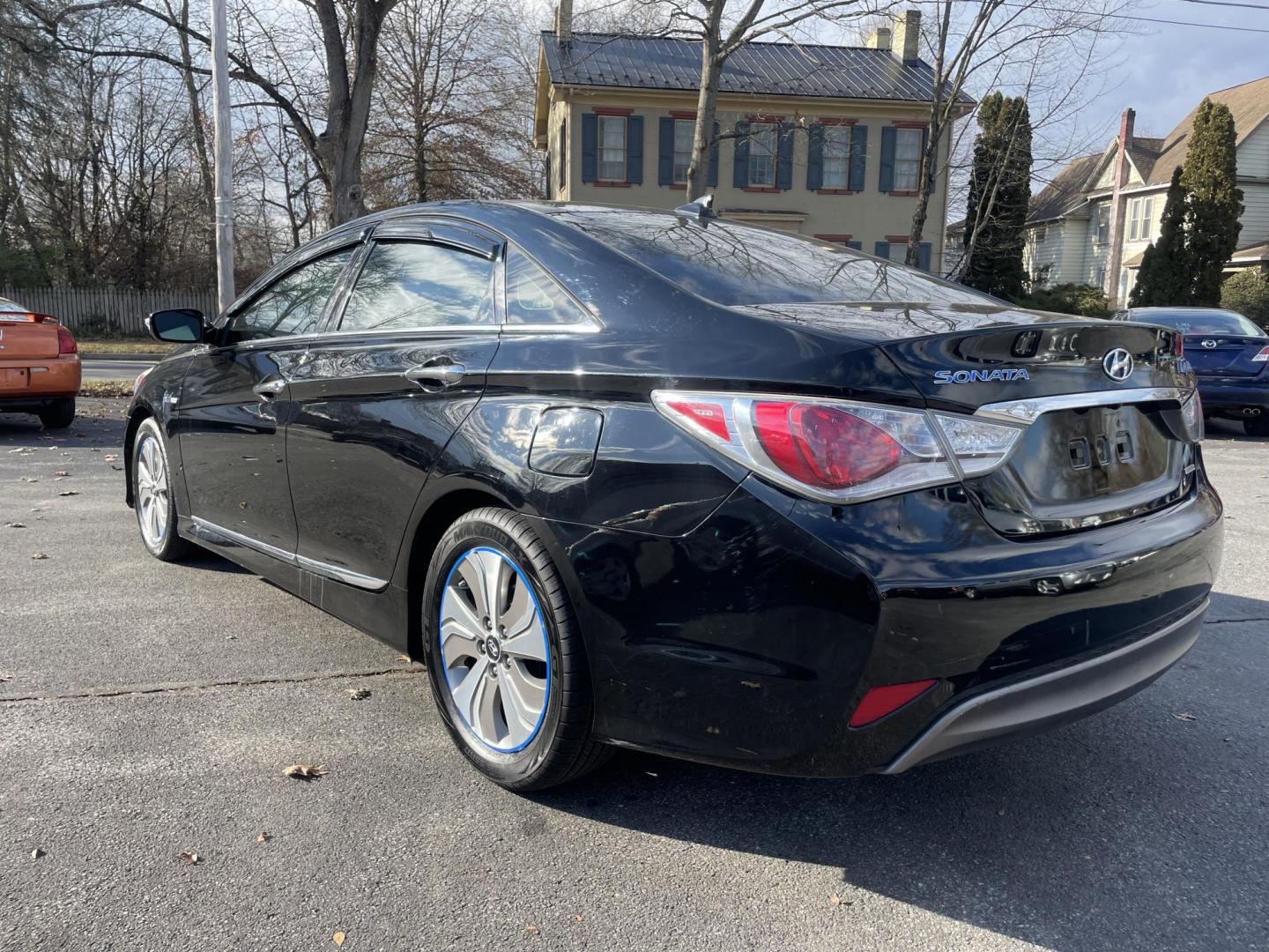 2015 black Hyundai Sonata Hybrid Sedan (KMHEC4A43FA) with an 2.4L L4 DOHC 16V HYBRID engine, 6-Speed Automatic transmission, located at 101 N. Main Street, Muncy, PA, 17756, (570) 546-5462, 41.207691, -76.785942 - Photo#2