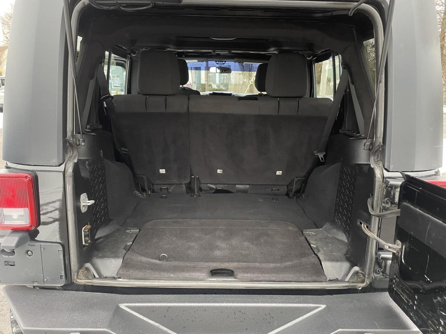 2011 black /black Jeep Wrangler Unlimited Sport 4WD (1J4BA3H1XBL) with an 3.8L V6 OHV 12V engine, located at 101 N. Main Street, Muncy, PA, 17756, (570) 546-5462, 41.207691, -76.785942 - Photo#9