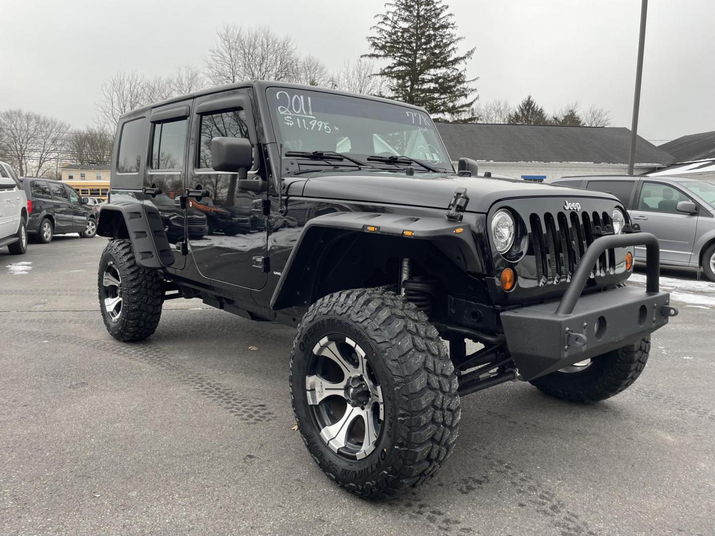 2011 black /black Jeep Wrangler Unlimited Sport 4WD (1J4BA3H1XBL) with an 3.8L V6 OHV 12V engine, located at 101 N. Main Street, Muncy, PA, 17756, (570) 546-5462, 41.207691, -76.785942 - Photo#1