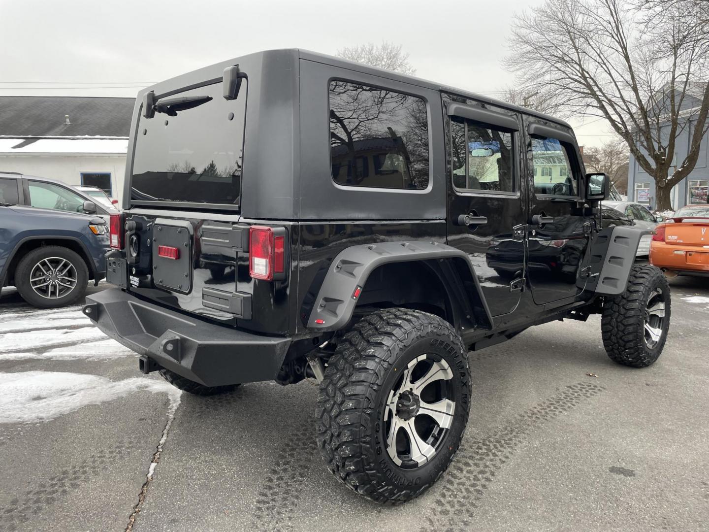 2011 black /black Jeep Wrangler Unlimited Sport 4WD (1J4BA3H1XBL) with an 3.8L V6 OHV 12V engine, located at 101 N. Main Street, Muncy, PA, 17756, (570) 546-5462, 41.207691, -76.785942 - Photo#5