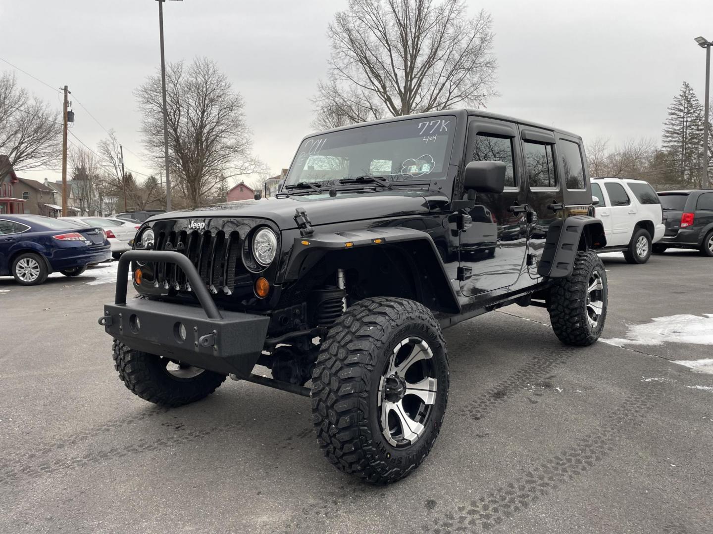 2011 black /black Jeep Wrangler Unlimited Sport 4WD (1J4BA3H1XBL) with an 3.8L V6 OHV 12V engine, located at 101 N. Main Street, Muncy, PA, 17756, (570) 546-5462, 41.207691, -76.785942 - Photo#0