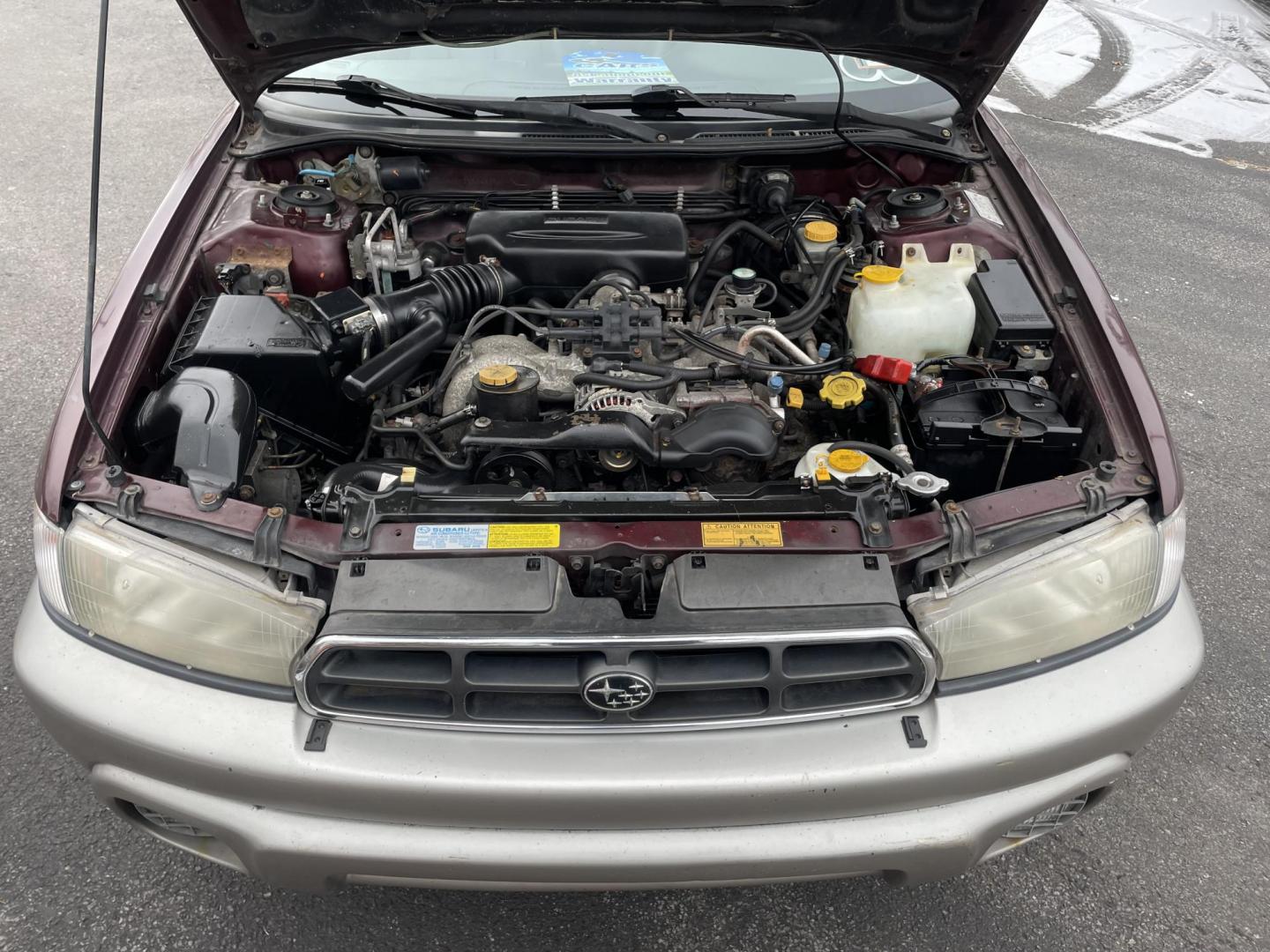 1999 burgandy Subaru Legacy Wagon Outback (4S3BG6851X7) with an 2.5L H4 DOHC 16V engine, 4-Speed Automatic Overdrive transmission, located at 101 N. Main Street, Muncy, PA, 17756, (570) 546-5462, 41.207691, -76.785942 - Photo#7