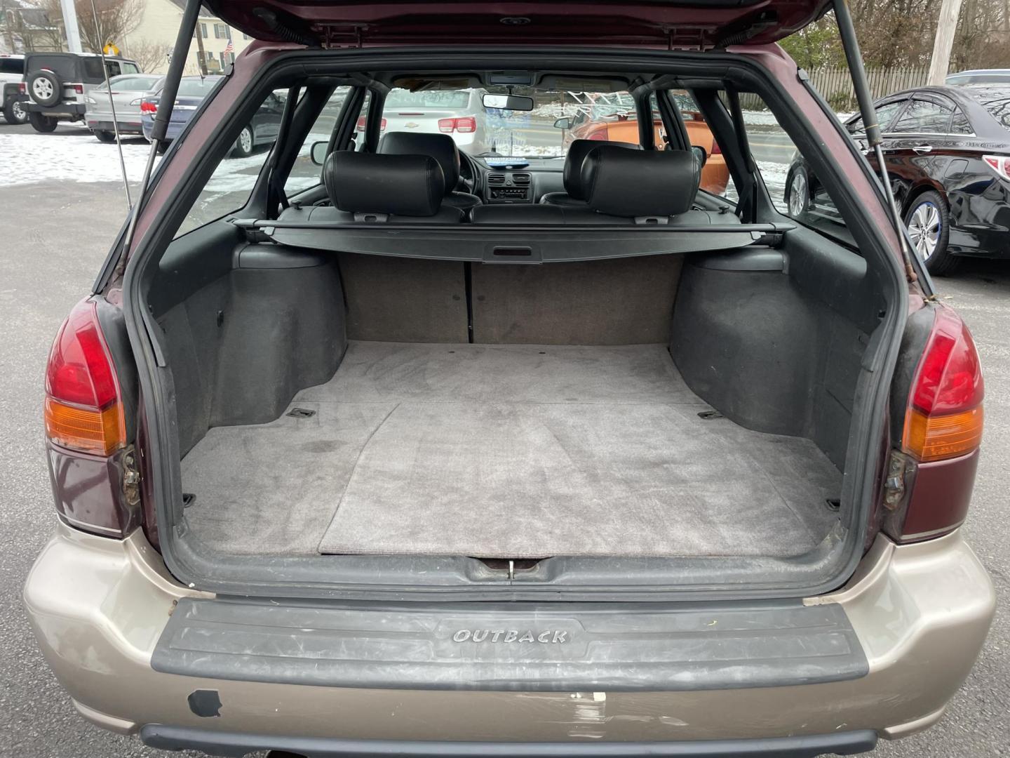 1999 burgandy Subaru Legacy Wagon Outback (4S3BG6851X7) with an 2.5L H4 DOHC 16V engine, 4-Speed Automatic Overdrive transmission, located at 101 N. Main Street, Muncy, PA, 17756, (570) 546-5462, 41.207691, -76.785942 - Photo#6