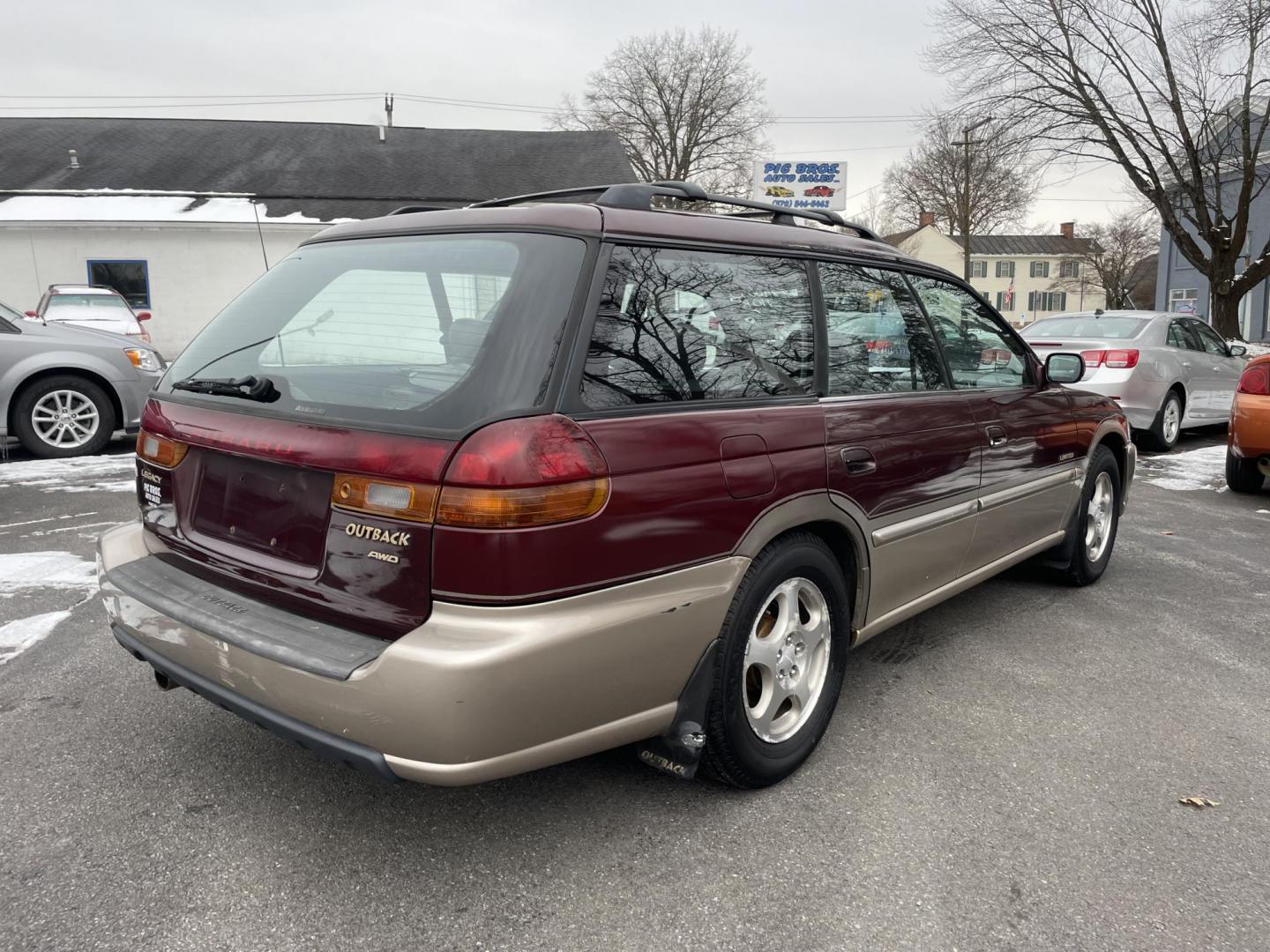 1999 burgandy Subaru Legacy Wagon Outback (4S3BG6851X7) with an 2.5L H4 DOHC 16V engine, 4-Speed Automatic Overdrive transmission, located at 101 N. Main Street, Muncy, PA, 17756, (570) 546-5462, 41.207691, -76.785942 - Photo#3