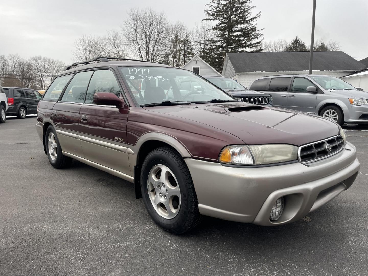 1999 burgandy Subaru Legacy Wagon Outback (4S3BG6851X7) with an 2.5L H4 DOHC 16V engine, 4-Speed Automatic Overdrive transmission, located at 101 N. Main Street, Muncy, PA, 17756, (570) 546-5462, 41.207691, -76.785942 - Photo#1