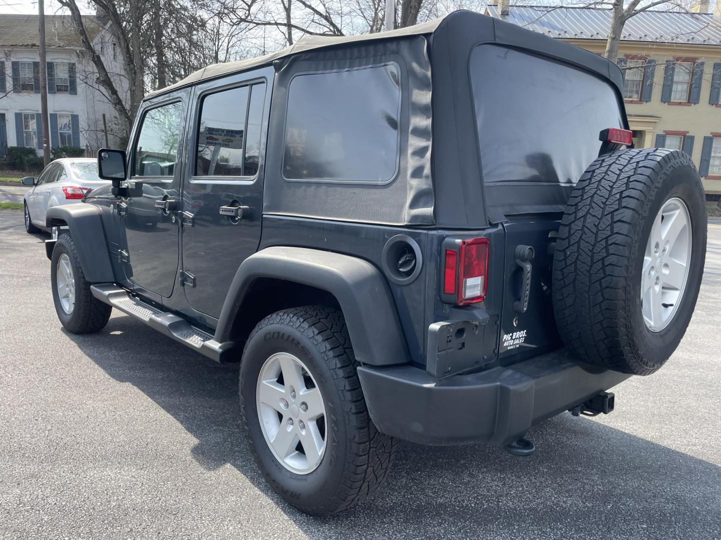 2016 Jeep Wrangler Unlimited Sport 4WD (1C4BJWDG6GL) with an 3.6L V6 DOHC 24V FFV engine, located at 101 N. Main Street, Muncy, PA, 17756, (570) 546-5462, 41.207691, -76.785942 - Photo#2