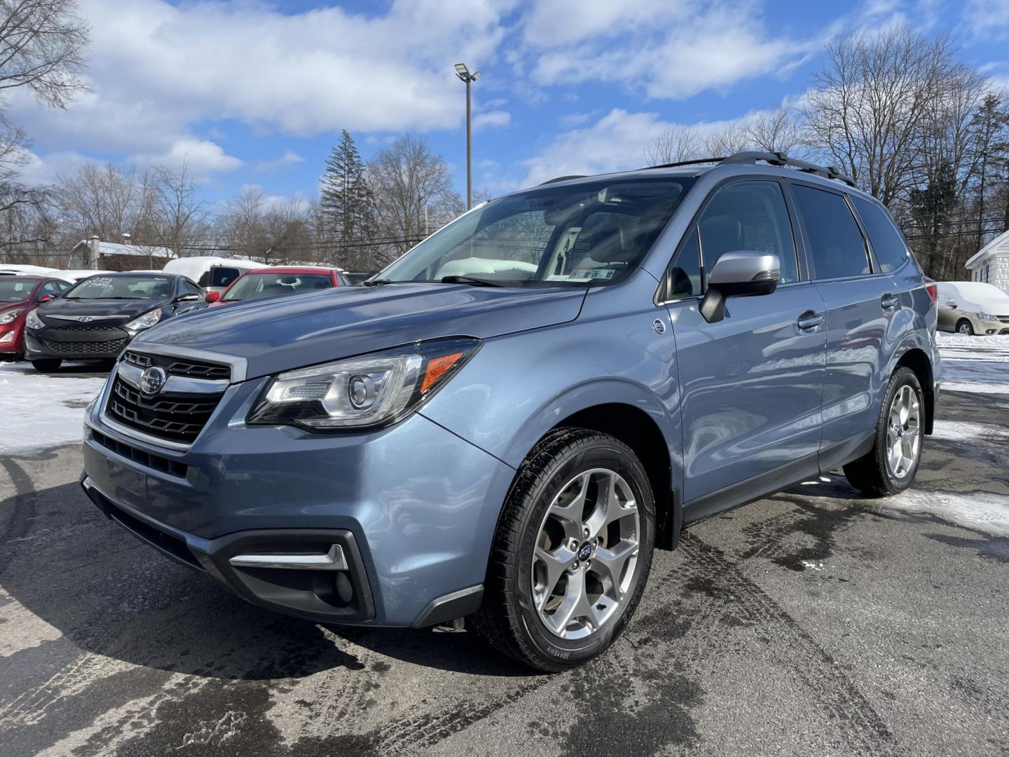 2018 Subaru Forester 2.5i Touring (JF2SJAWC1JH) with an 2.5L H4 SOHC 16V engine, CVT transmission, located at 101 N. Main Street, Muncy, PA, 17756, (570) 546-5462, 41.207691, -76.785942 - Photo#0