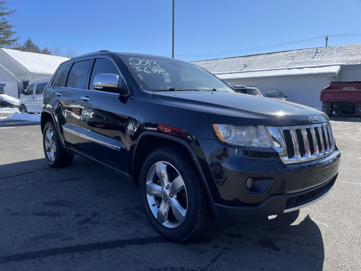 2013 black /black Jeep Grand Cherokee Limited 4WD (1C4RJFBG7DC) with an 3.6L V6 DOHC 24V engine, 5-Speed Automatic transmission, located at 101 N. Main Street, Muncy, PA, 17756, (570) 546-5462, 41.207691, -76.785942 - Photo#1