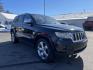 2013 black /black Jeep Grand Cherokee Limited 4WD (1C4RJFBG7DC) with an 3.6L V6 DOHC 24V engine, 5-Speed Automatic transmission, located at 101 N. Main Street, Muncy, PA, 17756, (570) 546-5462, 41.207691, -76.785942 - Photo#1