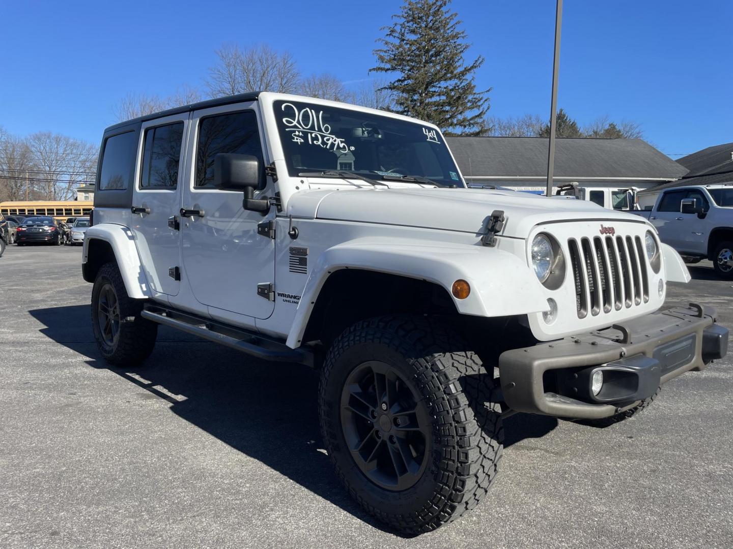 2016 White /black Jeep Wrangler Unlimited Sahara 4WD (1C4BJWEG2GL) with an 3.6L V6 DOHC 24V FFV engine, located at 101 N. Main Street, Muncy, PA, 17756, (570) 546-5462, 41.207691, -76.785942 - Photo#0