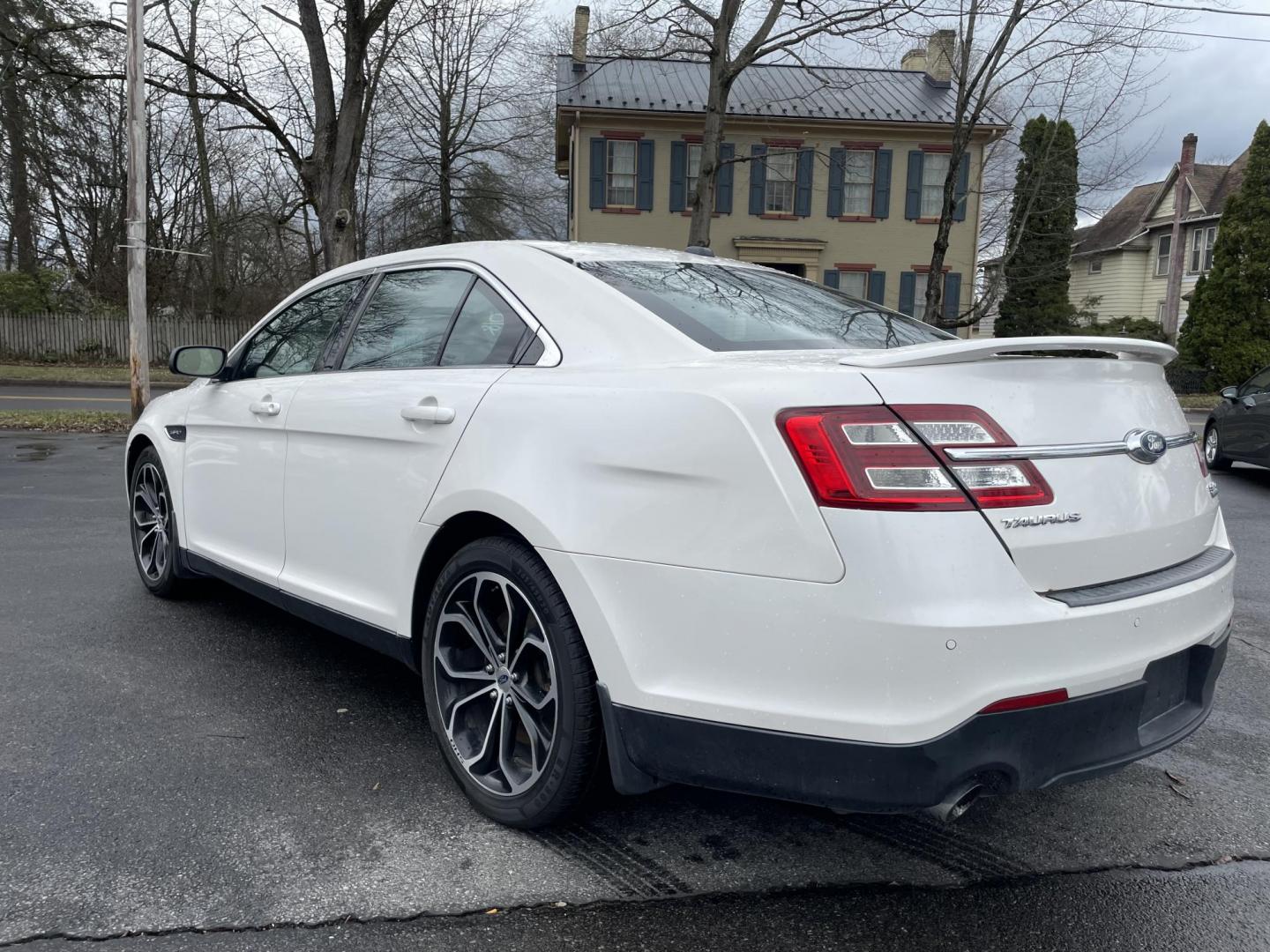 2015 White /black Ford Taurus SHO AWD (1FAHP2KT2FG) with an 3.5L V6 DOHC 24V engine, 6-Speed Automatic transmission, located at 101 N. Main Street, Muncy, PA, 17756, (570) 546-5462, 41.207691, -76.785942 - Photo#2