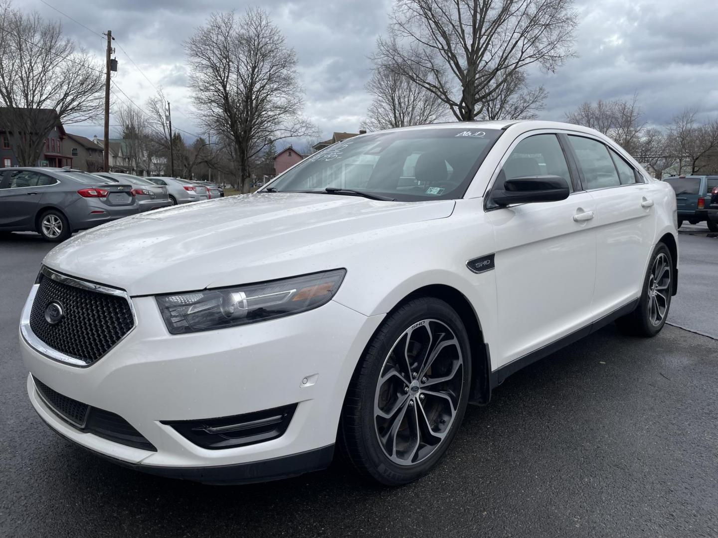 2015 White /black Ford Taurus SHO AWD (1FAHP2KT2FG) with an 3.5L V6 DOHC 24V engine, 6-Speed Automatic transmission, located at 101 N. Main Street, Muncy, PA, 17756, (570) 546-5462, 41.207691, -76.785942 - Photo#0