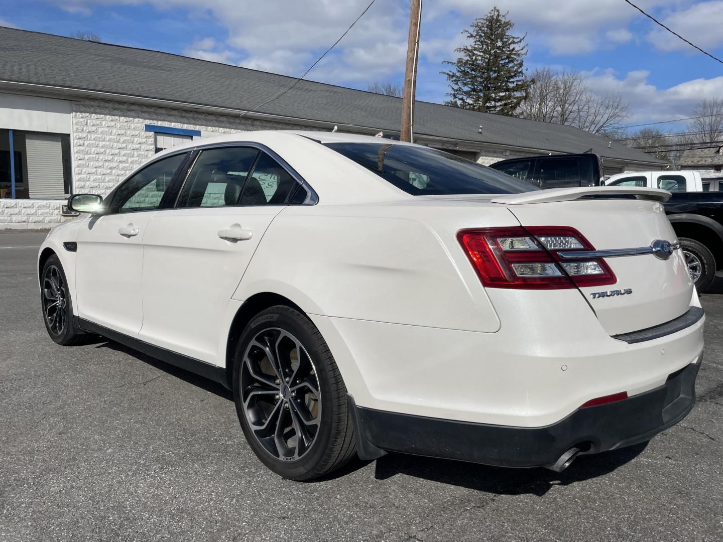 2015 White /black Ford Taurus SHO AWD (1FAHP2KT2FG) with an 3.5L V6 DOHC 24V engine, 6-Speed Automatic transmission, located at 101 N. Main Street, Muncy, PA, 17756, (570) 546-5462, 41.207691, -76.785942 - Photo#2