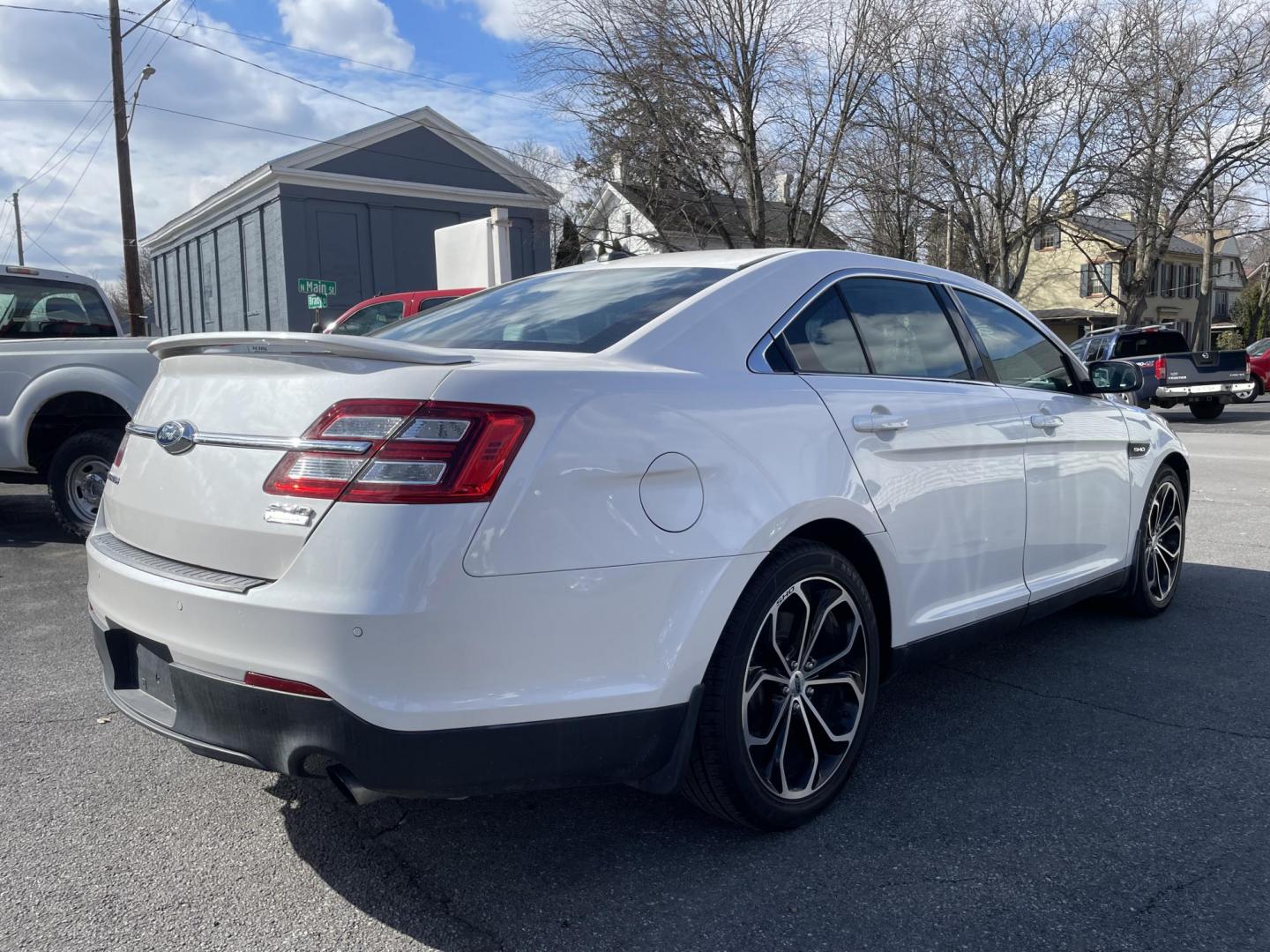 2015 White /black Ford Taurus SHO AWD (1FAHP2KT2FG) with an 3.5L V6 DOHC 24V engine, 6-Speed Automatic transmission, located at 101 N. Main Street, Muncy, PA, 17756, (570) 546-5462, 41.207691, -76.785942 - Photo#3