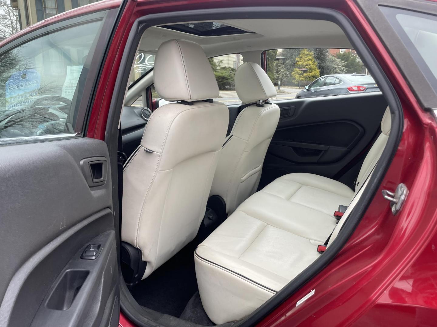 2013 burgandy Ford Fiesta Titanium Sedan (3FADP4CJ6DM) with an 1.6L L4 DOHC 16V engine, located at 101 N. Main Street, Muncy, PA, 17756, (570) 546-5462, 41.207691, -76.785942 - Photo#5