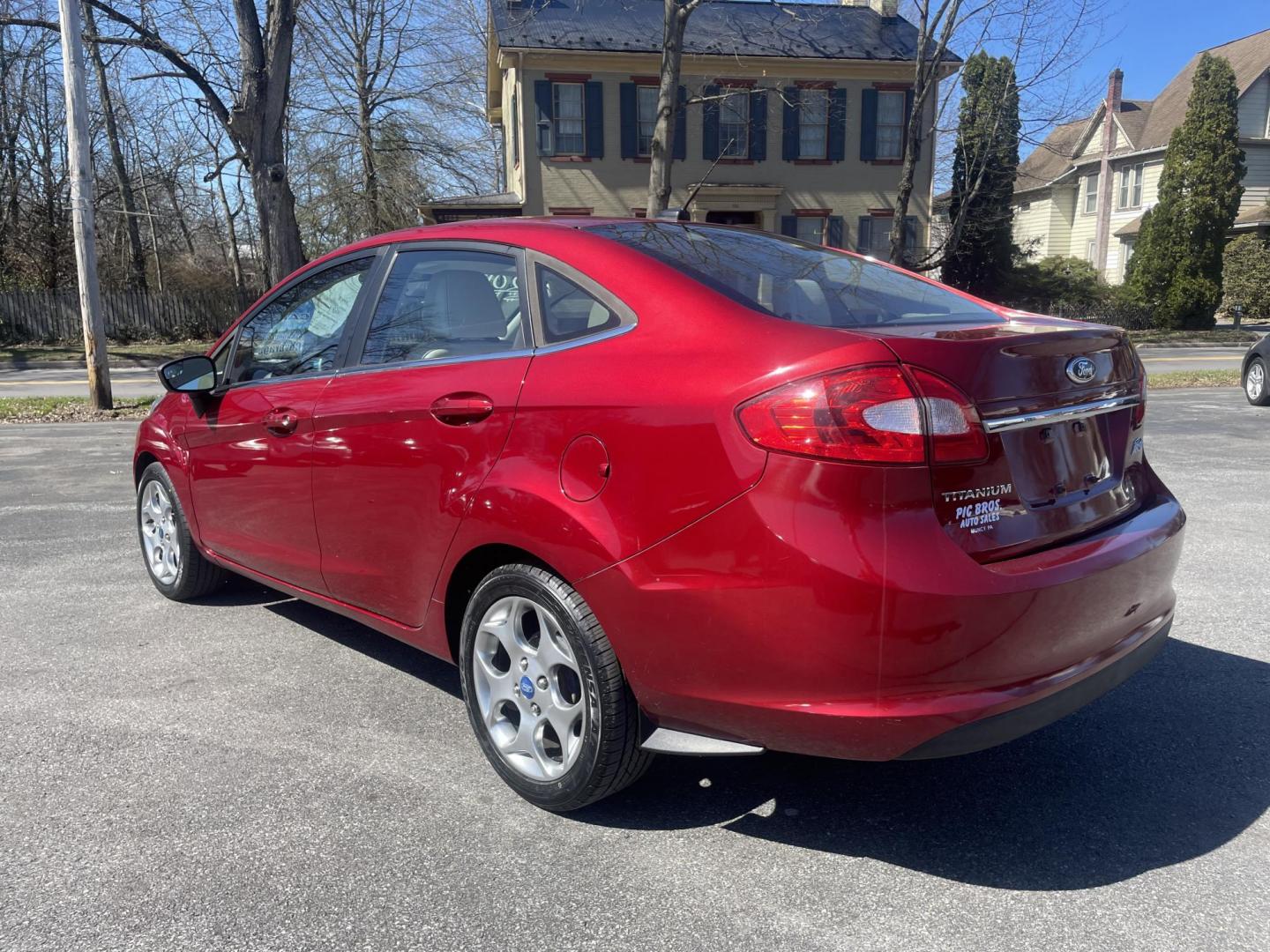 2013 burgandy Ford Fiesta Titanium Sedan (3FADP4CJ6DM) with an 1.6L L4 DOHC 16V engine, located at 101 N. Main Street, Muncy, PA, 17756, (570) 546-5462, 41.207691, -76.785942 - Photo#2