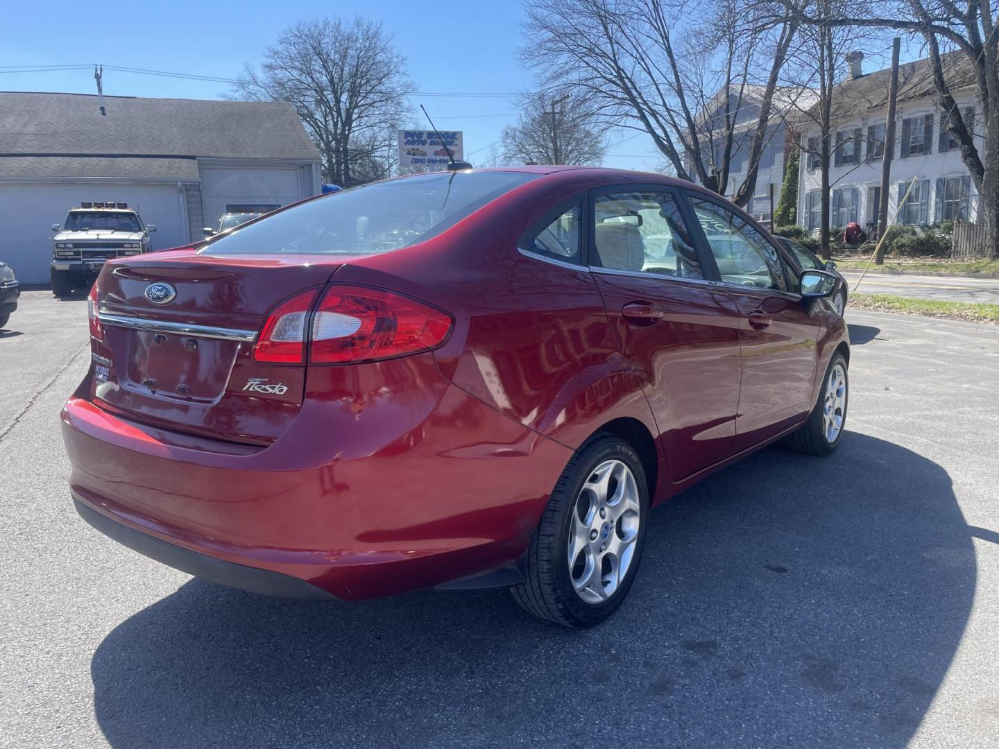 2013 burgandy Ford Fiesta Titanium Sedan (3FADP4CJ6DM) with an 1.6L L4 DOHC 16V engine, located at 101 N. Main Street, Muncy, PA, 17756, (570) 546-5462, 41.207691, -76.785942 - Photo#3