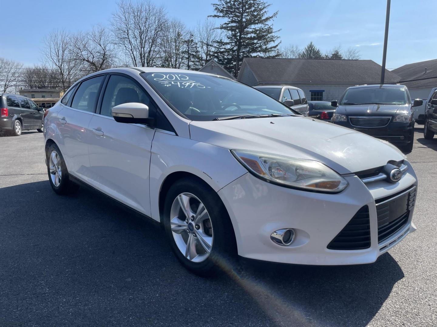 2012 White /black Ford Focus SEL Sedan (1FAHP3H26CL) with an 2.0L L4 DOHC 16V engine, 6-Speed Automatic transmission, located at 101 N. Main Street, Muncy, PA, 17756, (570) 546-5462, 41.207691, -76.785942 - Photo#2