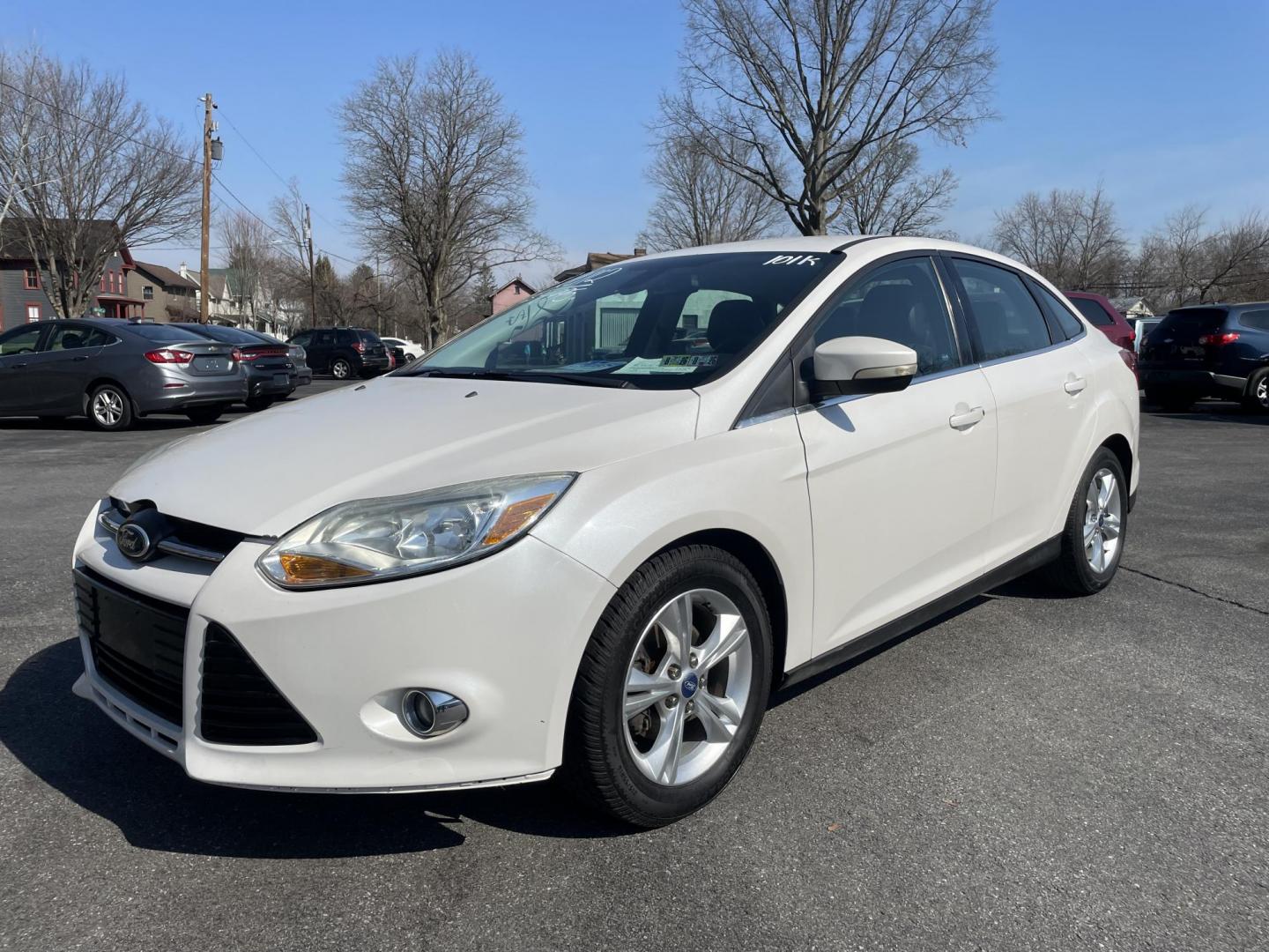 2012 White /black Ford Focus SEL Sedan (1FAHP3H26CL) with an 2.0L L4 DOHC 16V engine, 6-Speed Automatic transmission, located at 101 N. Main Street, Muncy, PA, 17756, (570) 546-5462, 41.207691, -76.785942 - Photo#0
