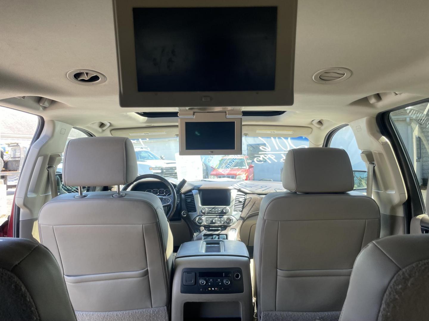 2016 burgandy /tan Chevrolet Suburban LT 4WD (1GNSKHKCXGR) with an 5.3L V8 OHV 16V engine, 6A transmission, located at 101 N. Main Street, Muncy, PA, 17756, (570) 546-5462, 41.207691, -76.785942 - Photo#7