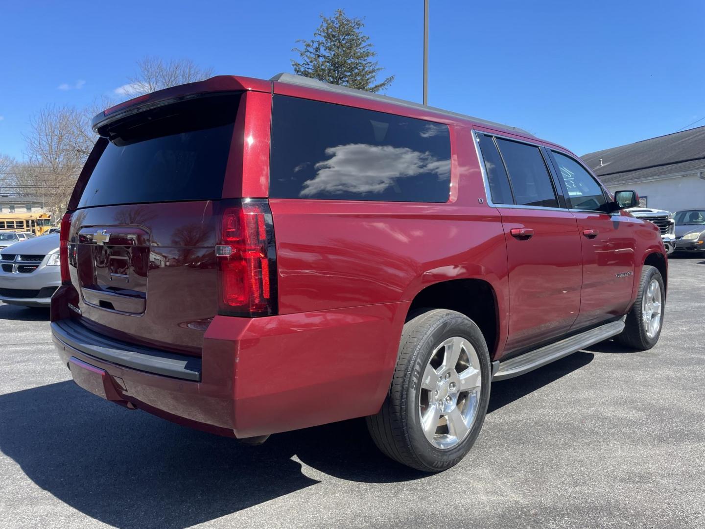 2016 burgandy /tan Chevrolet Suburban LT 4WD (1GNSKHKCXGR) with an 5.3L V8 OHV 16V engine, 6A transmission, located at 101 N. Main Street, Muncy, PA, 17756, (570) 546-5462, 41.207691, -76.785942 - Photo#4
