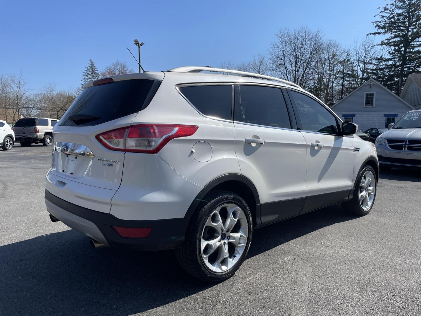 2014 White /black Ford Escape Titanium 4WD (1FMCU9J92EU) with an 2.0L L4 DOHC 16V engine, 6-Speed Automatic transmission, located at 101 N. Main Street, Muncy, PA, 17756, (570) 546-5462, 41.207691, -76.785942 - Photo#3