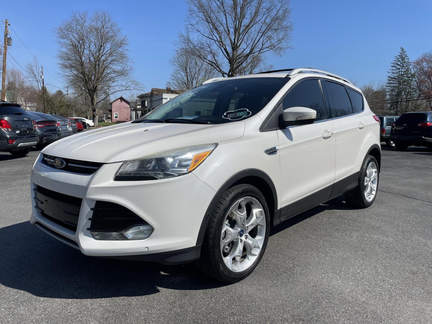 2014 White /black Ford Escape Titanium 4WD (1FMCU9J92EU) with an 2.0L L4 DOHC 16V engine, 6-Speed Automatic transmission, located at 101 N. Main Street, Muncy, PA, 17756, (570) 546-5462, 41.207691, -76.785942 - Photo#0