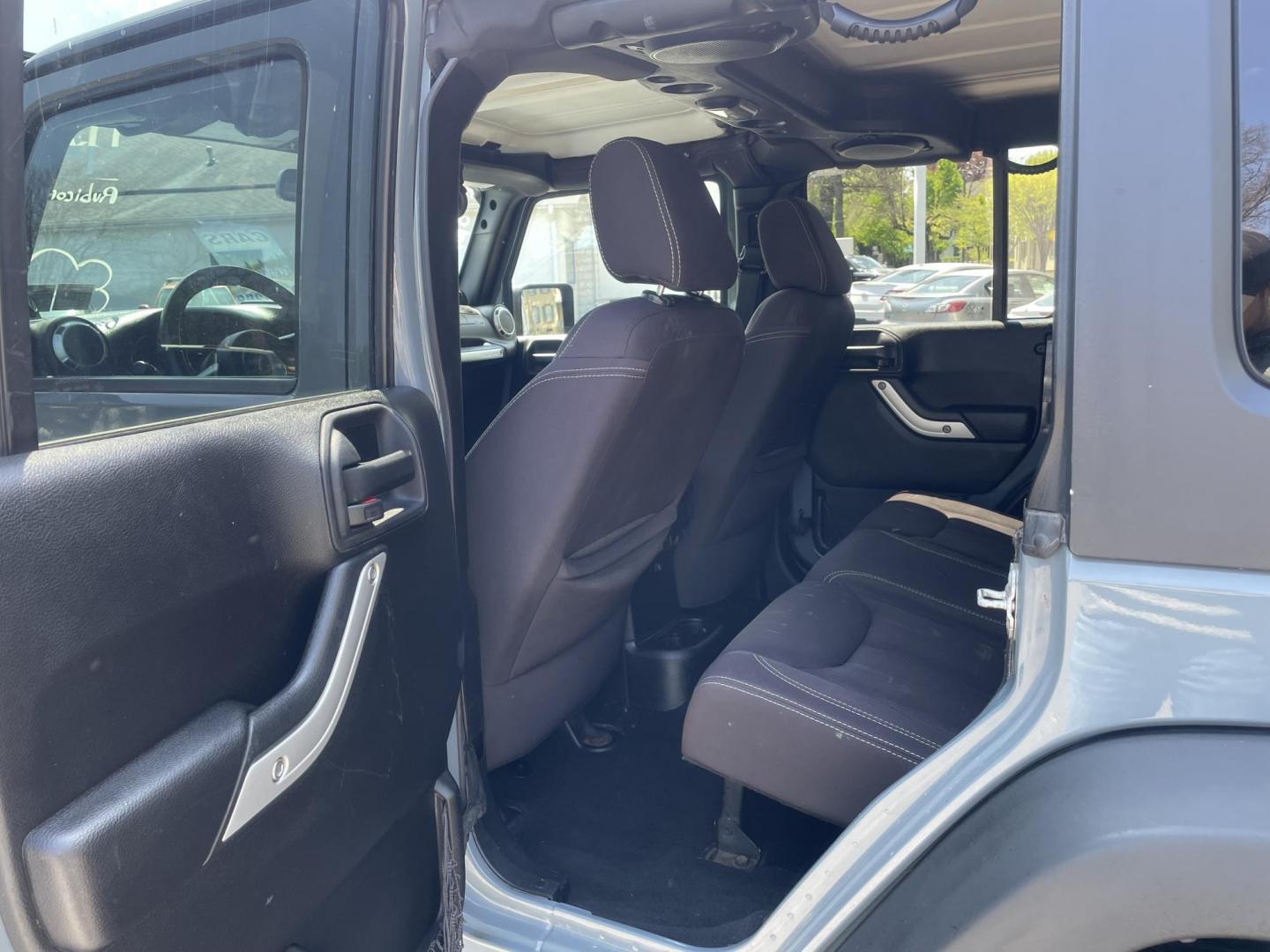2014 Jeep Wrangler Unlimited Rubicon 4WD (1C4BJWFG8EL) with an 3.6L V6 DOHC 24V FFV engine, 6 Speed Manual transmission, located at 101 N. Main Street, Muncy, PA, 17756, (570) 546-5462, 41.207691, -76.785942 - Photo#7