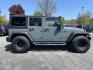 2014 Jeep Wrangler Unlimited Rubicon 4WD (1C4BJWFG8EL) with an 3.6L V6 DOHC 24V FFV engine, 6 Speed Manual transmission, located at 101 N. Main Street, Muncy, PA, 17756, (570) 546-5462, 41.207691, -76.785942 - Photo#4