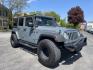 2014 Jeep Wrangler Unlimited Rubicon 4WD (1C4BJWFG8EL) with an 3.6L V6 DOHC 24V FFV engine, 6 Speed Manual transmission, located at 101 N. Main Street, Muncy, PA, 17756, (570) 546-5462, 41.207691, -76.785942 - Photo#2