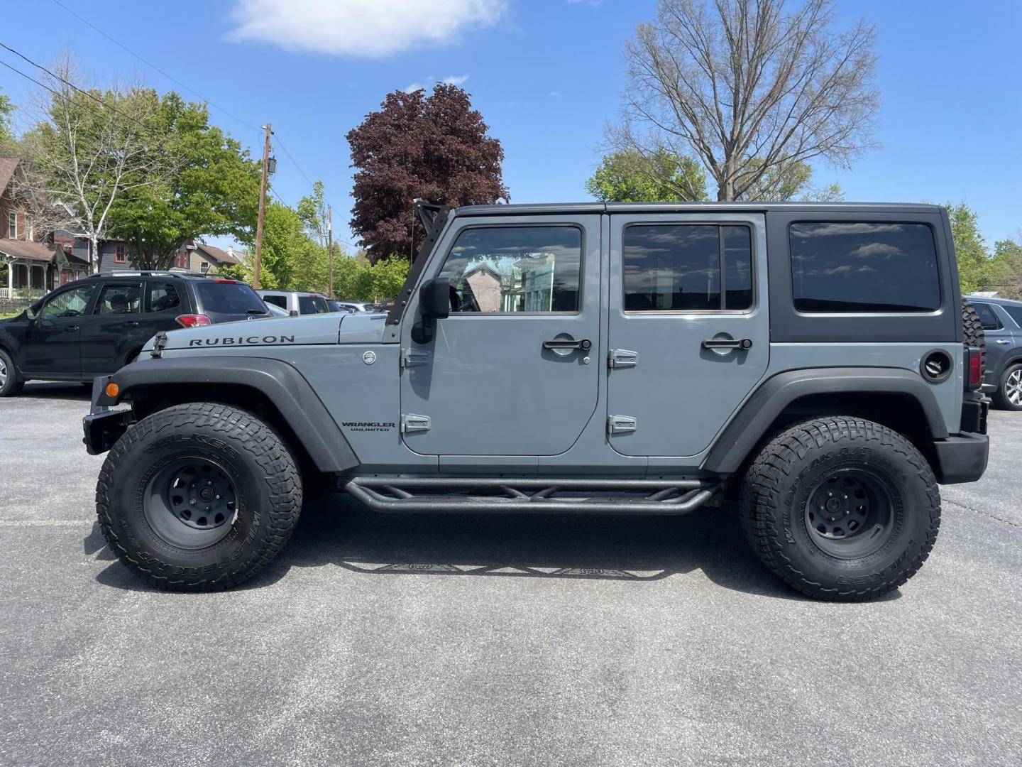 2014 Jeep Wrangler Unlimited Rubicon 4WD (1C4BJWFG8EL) with an 3.6L V6 DOHC 24V FFV engine, 6 Speed Manual transmission, located at 101 N. Main Street, Muncy, PA, 17756, (570) 546-5462, 41.207691, -76.785942 - Photo#5
