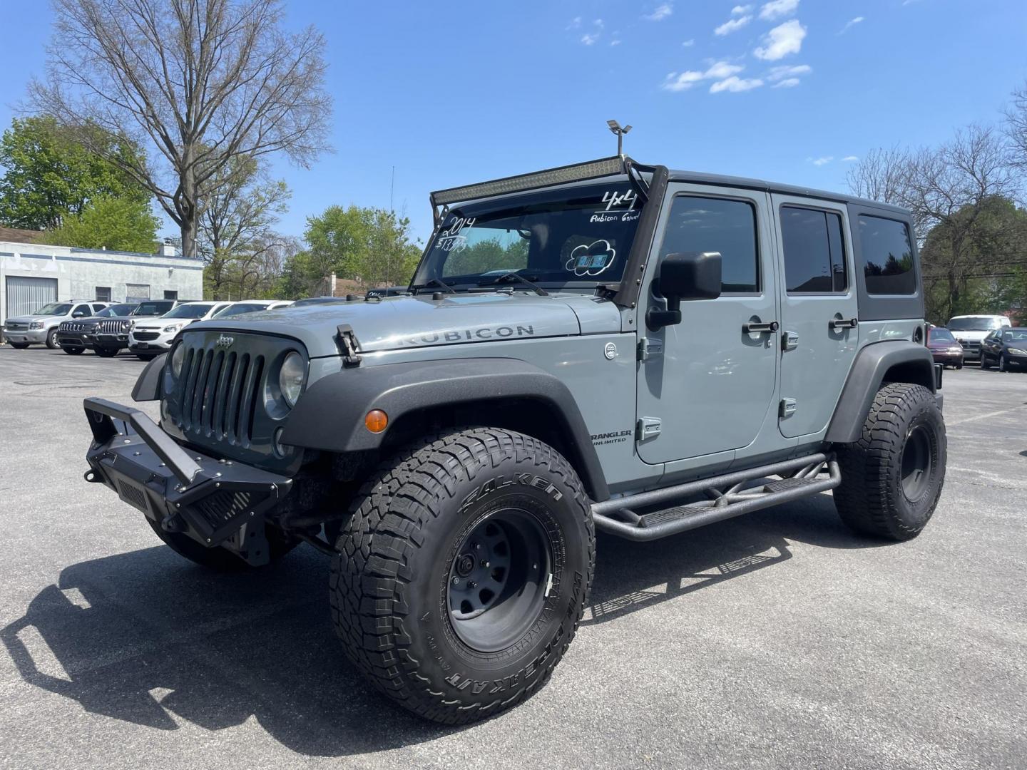 2014 Jeep Wrangler Unlimited Rubicon 4WD (1C4BJWFG8EL) with an 3.6L V6 DOHC 24V FFV engine, 6 Speed Manual transmission, located at 101 N. Main Street, Muncy, PA, 17756, (570) 546-5462, 41.207691, -76.785942 - Photo#0