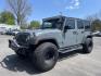 2014 Jeep Wrangler Unlimited Rubicon 4WD (1C4BJWFG8EL) with an 3.6L V6 DOHC 24V FFV engine, 6 Speed Manual transmission, located at 101 N. Main Street, Muncy, PA, 17756, (570) 546-5462, 41.207691, -76.785942 - Photo#0