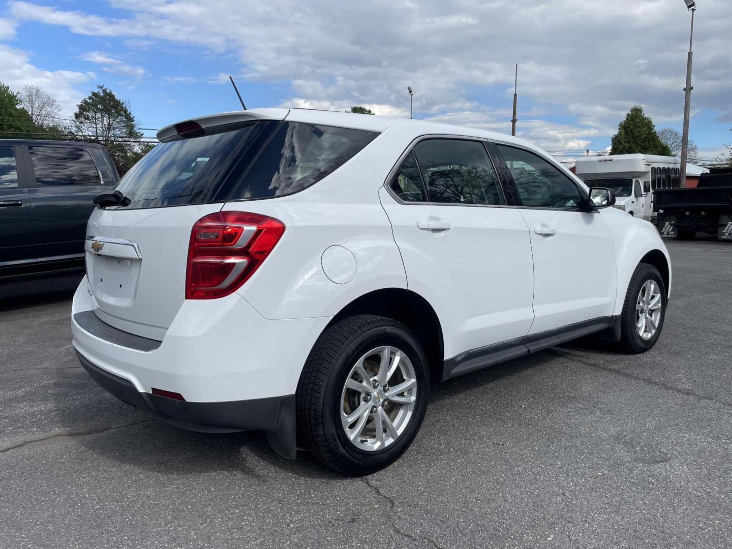 2017 White Chevrolet Equinox LS AWD (2GNFLEEK0H6) with an 2.4L L4 DOHC 16V FFV engine, 6A transmission, located at 101 N. Main Street, Muncy, PA, 17756, (570) 546-5462, 41.207691, -76.785942 - Photo#2