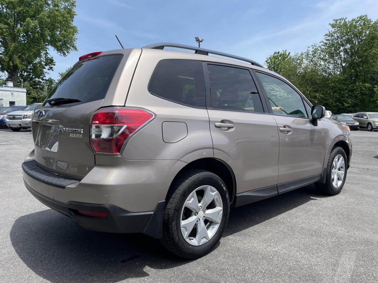 2015 Subaru Forester 2.5i Premium (JF2SJADC6FH) with an 2.5L H4 SOHC 16V engine, 6-Speed Automatic transmission, located at 101 N. Main Street, Muncy, PA, 17756, (570) 546-5462, 41.207691, -76.785942 - Photo#1