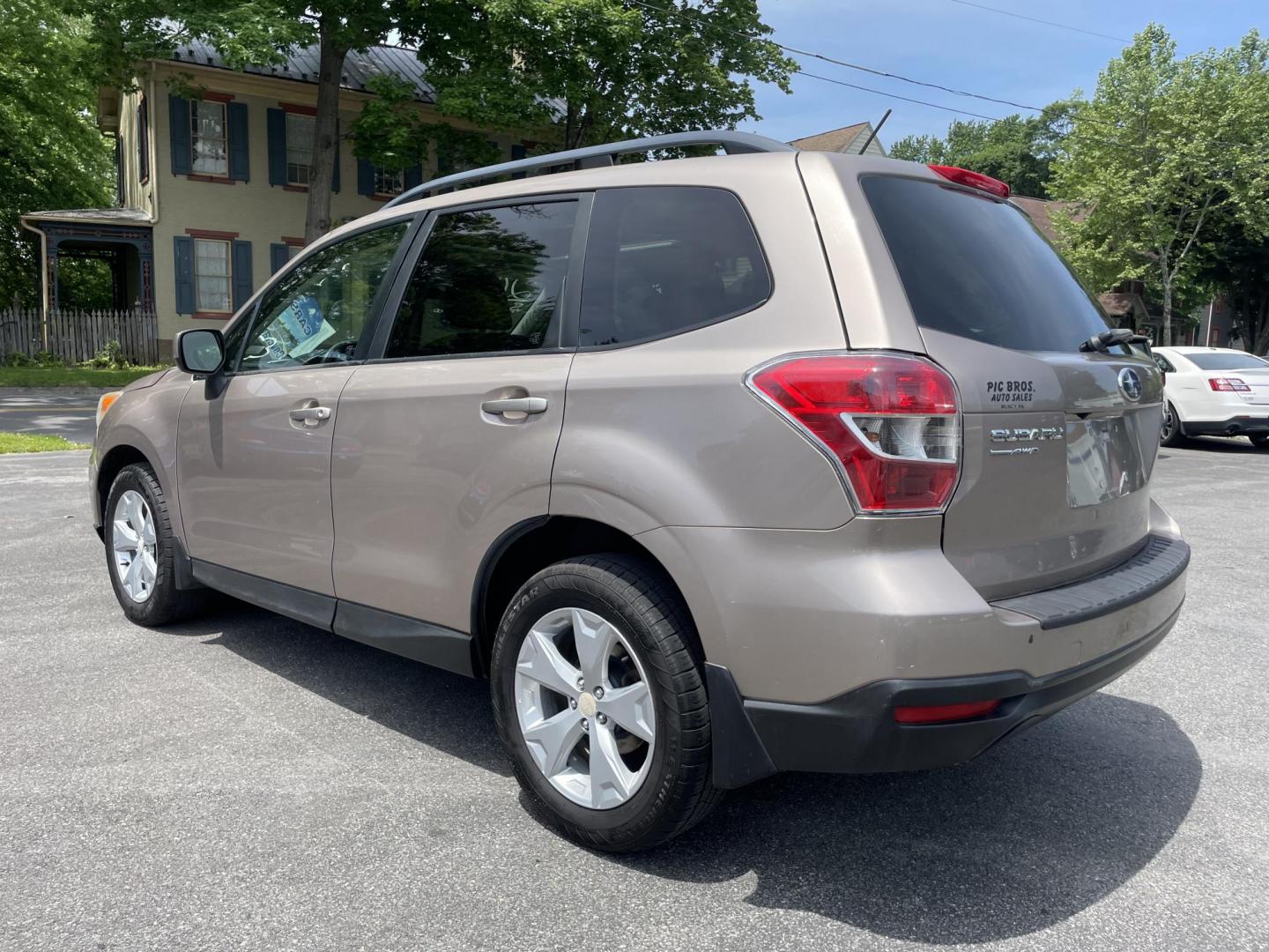 2015 Subaru Forester 2.5i Premium (JF2SJADC6FH) with an 2.5L H4 SOHC 16V engine, 6-Speed Automatic transmission, located at 101 N. Main Street, Muncy, PA, 17756, (570) 546-5462, 41.207691, -76.785942 - Photo#2