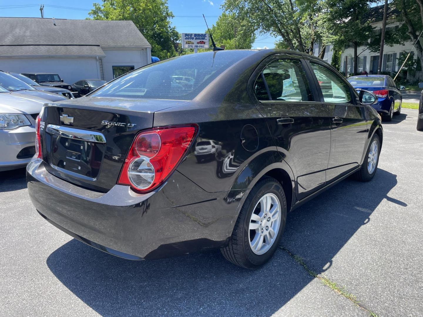 2014 Chevrolet Sonic LT Auto Sedan (1G1JC5SGXE4) with an 1.8L L4 DOHC 24V engine, 6-Speed Automatic transmission, located at 101 N. Main Street, Muncy, PA, 17756, (570) 546-5462, 41.207691, -76.785942 - Photo#3
